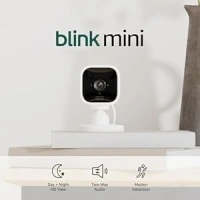 Blink Mini – Compact indoor plug-in smart security camera, 1080p HD video, night vision, motion detection, two-way audio, easy set up, Works with Alexa – 1 camera (White)